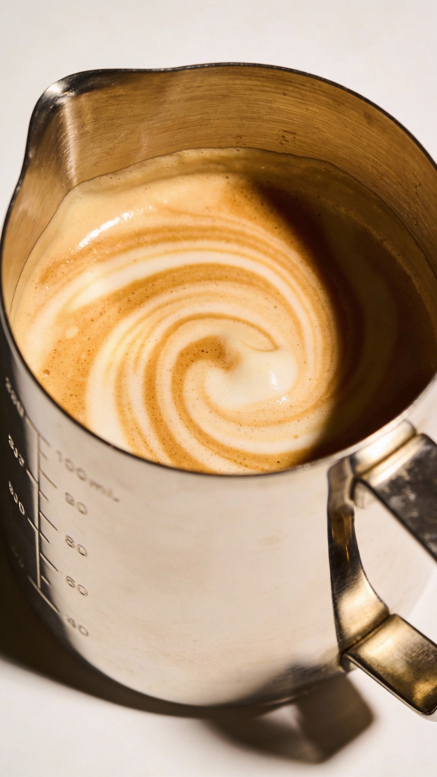 stainless steel blender cup with creamy keto coffee shake swirl