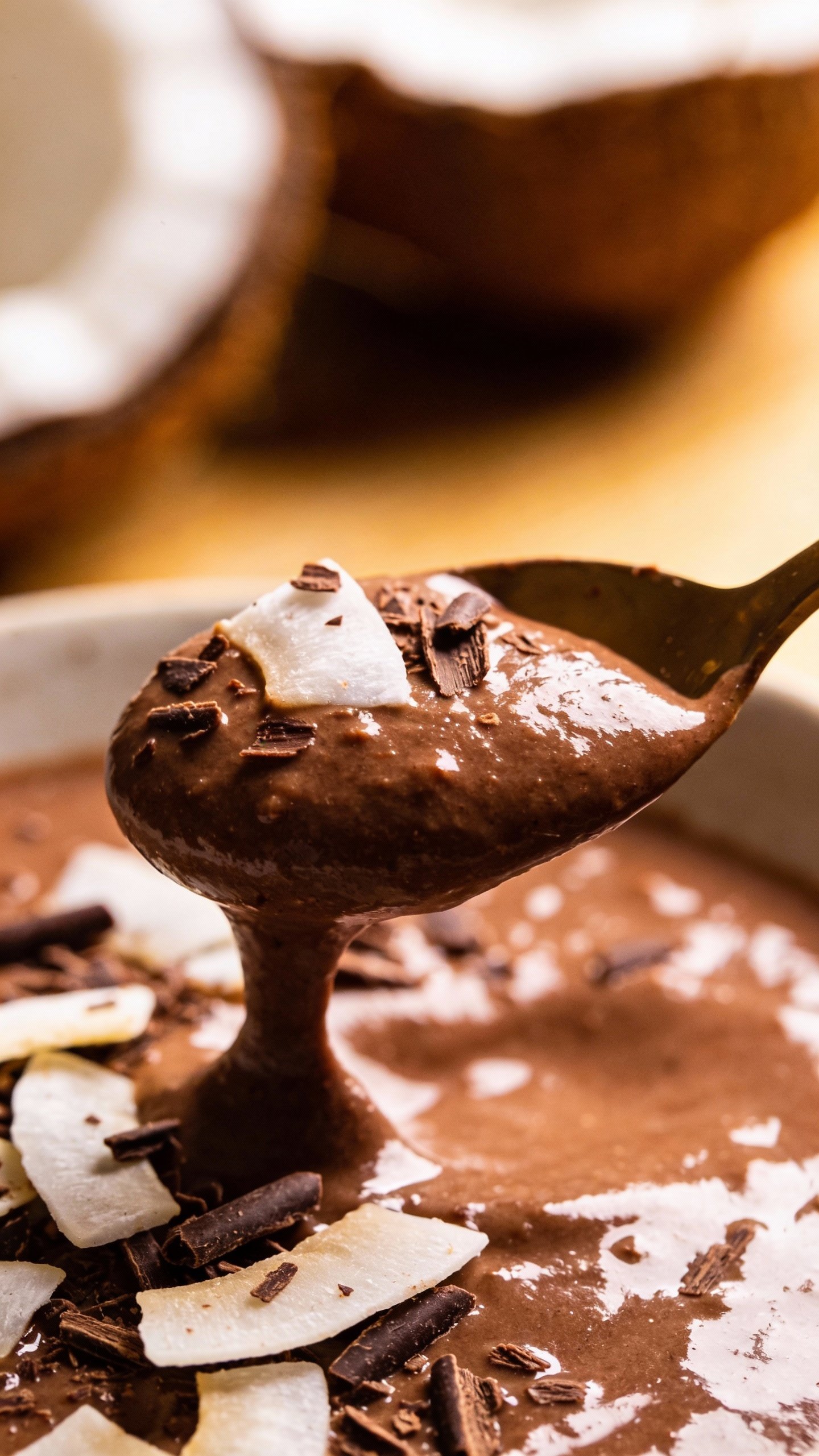 spoonful of chocolate-coconut keto smoothie, glossy texture